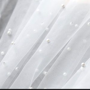 120” cathedral veil worn for 3 hours great condition. Light ivory.